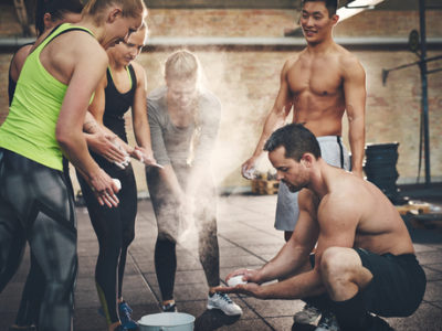 group of athletic people getting ready for work out