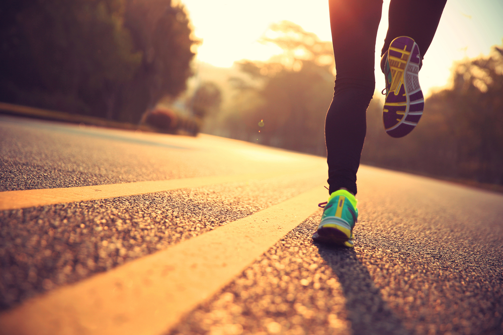 female runner, running shoes