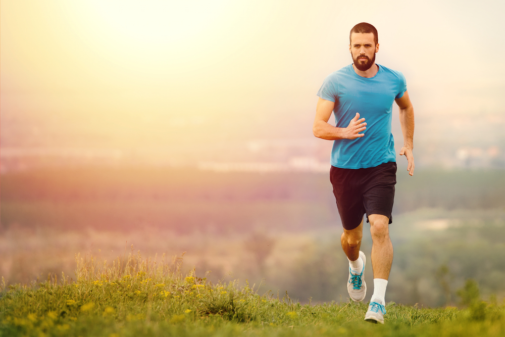 healthy man who uses Progentra taking a run outdoors