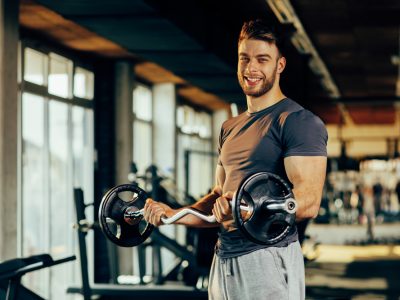 fit guy who takes Progentra exercising in gym